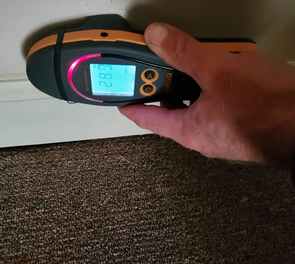 Moisture detection at baseboard during Burst Pipe Cleanup in Johnstown